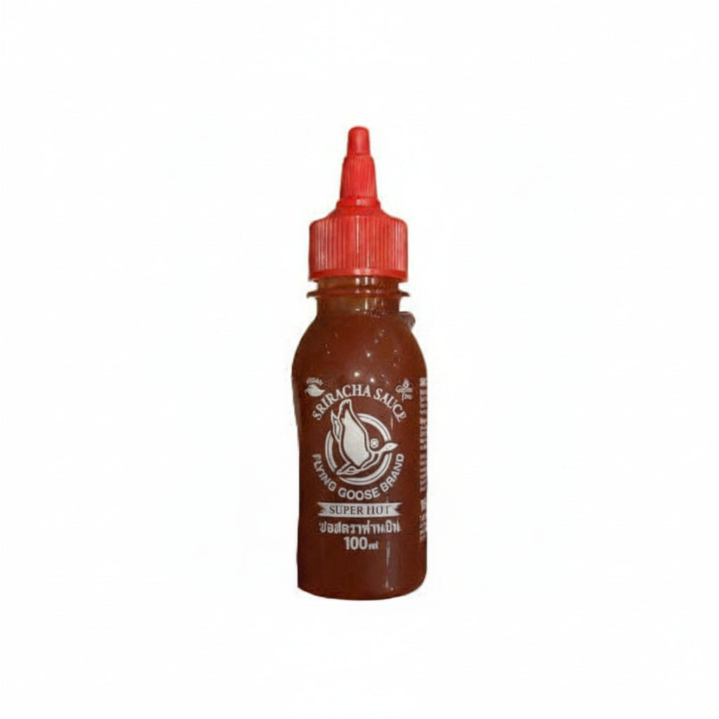 Bottle of Super Hot Sriracha Sauce with red cap on white background