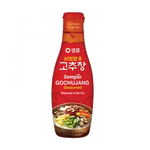 Bottle of Sempio Gochujang on a white background