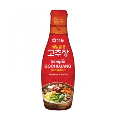 Bottle of Sempio Gochujang on a white background