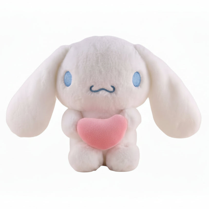 Plush toy with large ears and a pink heart on a white background