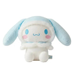 Cute plush toy with blue ears and a white face on a light gray background