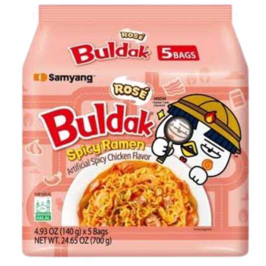 A package of Samyang Buldak Spicy Ramen in the Rosé Artificial Spicy Chicken Flavor, containing 5 bags. The packaging is light pink with the iconic red Buldak logo and an illustration of a white cat wearing a yellow helmet and magnifying glass.