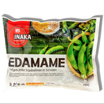 A 300g package of Inaka Edamame, featuring a white and green plastic bag with a red circular logo and images of fresh green edamame pods.