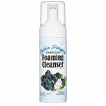 A bottle of LookKATME Bubble Purifying Charcoal Foaming Cleanser with a white pump dispenser and a label featuring charcoal and green tea illustrations, set against a plain white background.