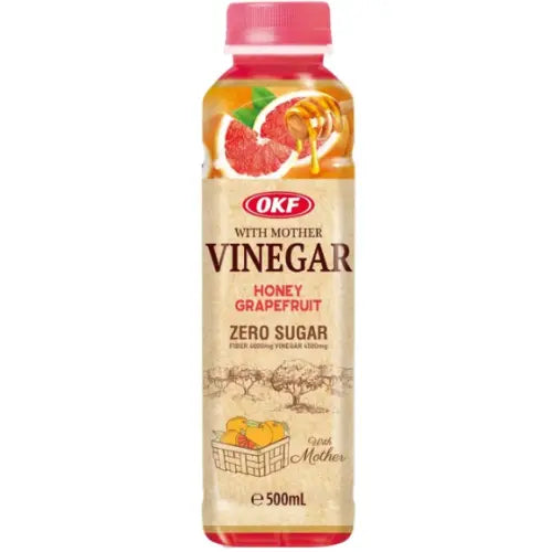 A 500ml bottle of OKF With Mother Vinegar Honey Grapefruit Zero Sugar on a plain white background.