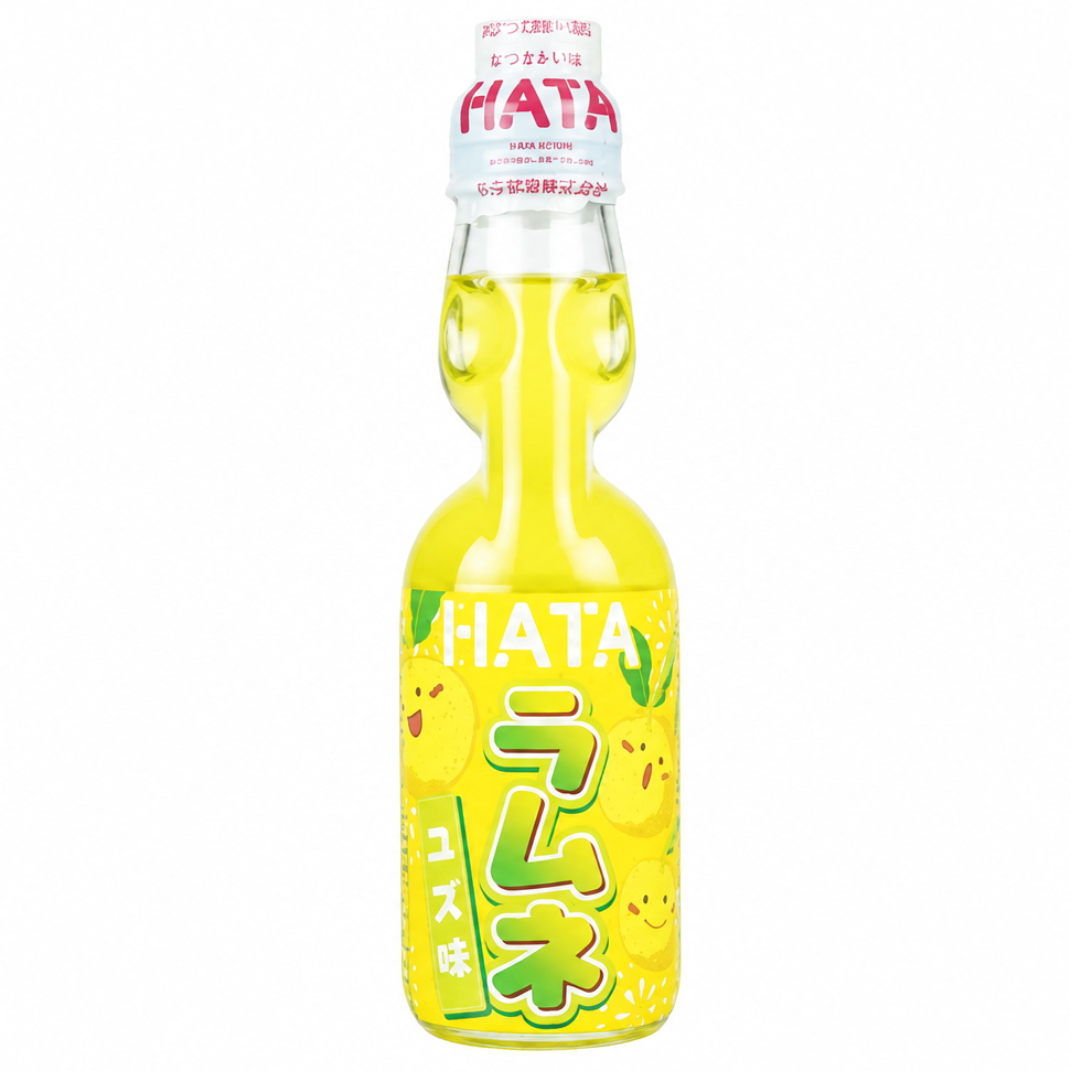 Hata Ramune Yuzu Japanese soda bottle on a clean white background with extra space on the left and right